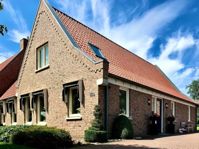 Woning met inwoning in Albergen, gebouwd door Aannemersbedrijf Scholte op Reimer
